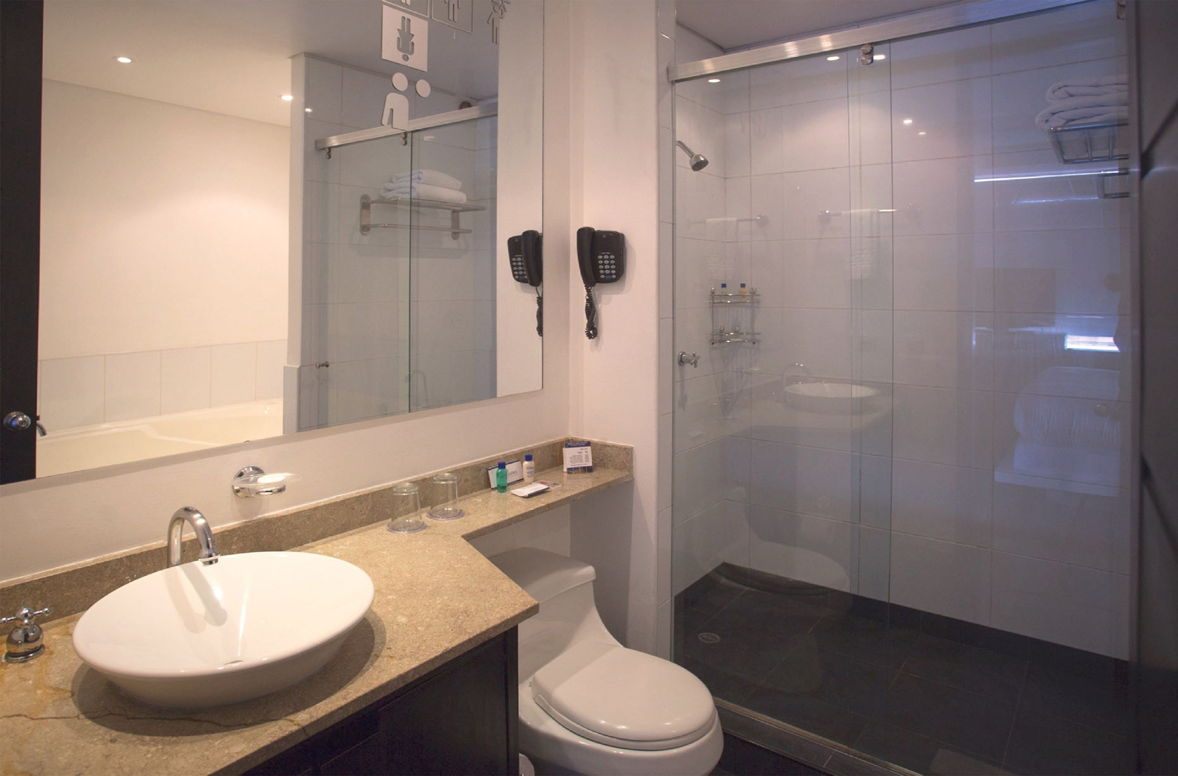 hair dryer, bathrobes, slippers, towels