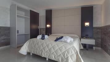 Suite Superior | Biancheria da letto di alta qualità, minibar, una cassaforte in camera