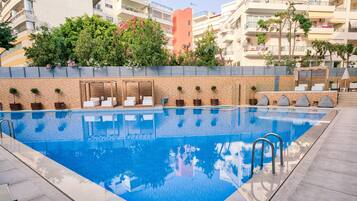 Seasonal outdoor pool, pool umbrellas, sun loungers