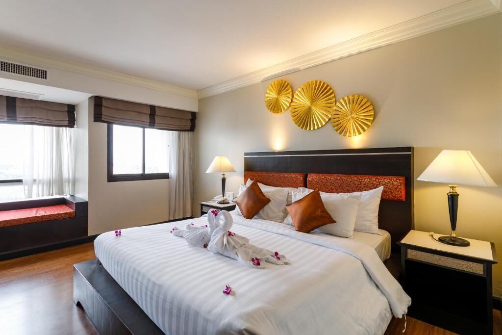 Camas con pillow-top, minibar y caja de seguridad en la habitación 