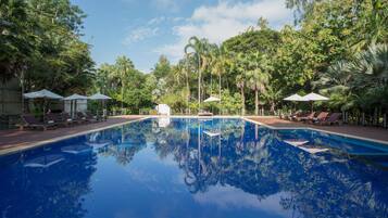 Outdoor pool, pool umbrellas, sun loungers