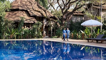 Outdoor pool, pool umbrellas, sun loungers