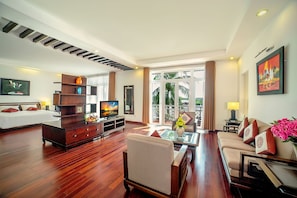 Family Suite, River View | Minibar, in-room safe, individually decorated, desk - Hoi An Beach Resort (Da Nang)