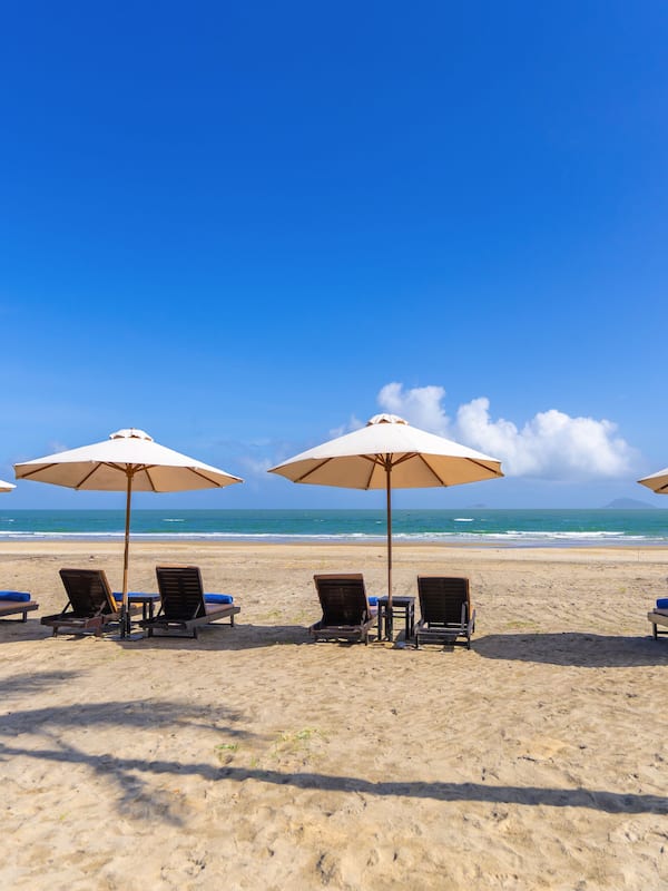 Private beach, white sand, sun loungers, beach umbrellas