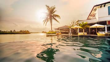 2 outdoor pools, pool umbrellas, pool loungers