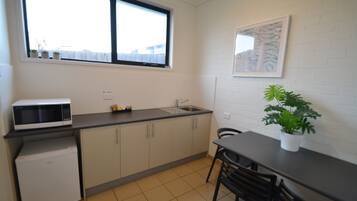 Superior Twin Room | Private kitchenette | Fridge, electric kettle