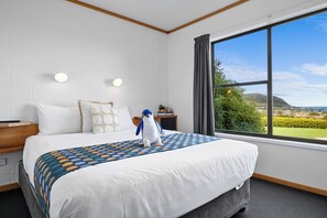 Two Bedroom Seaview Apartment | Free minibar items, desk, laptop workspace, iron/ironing board