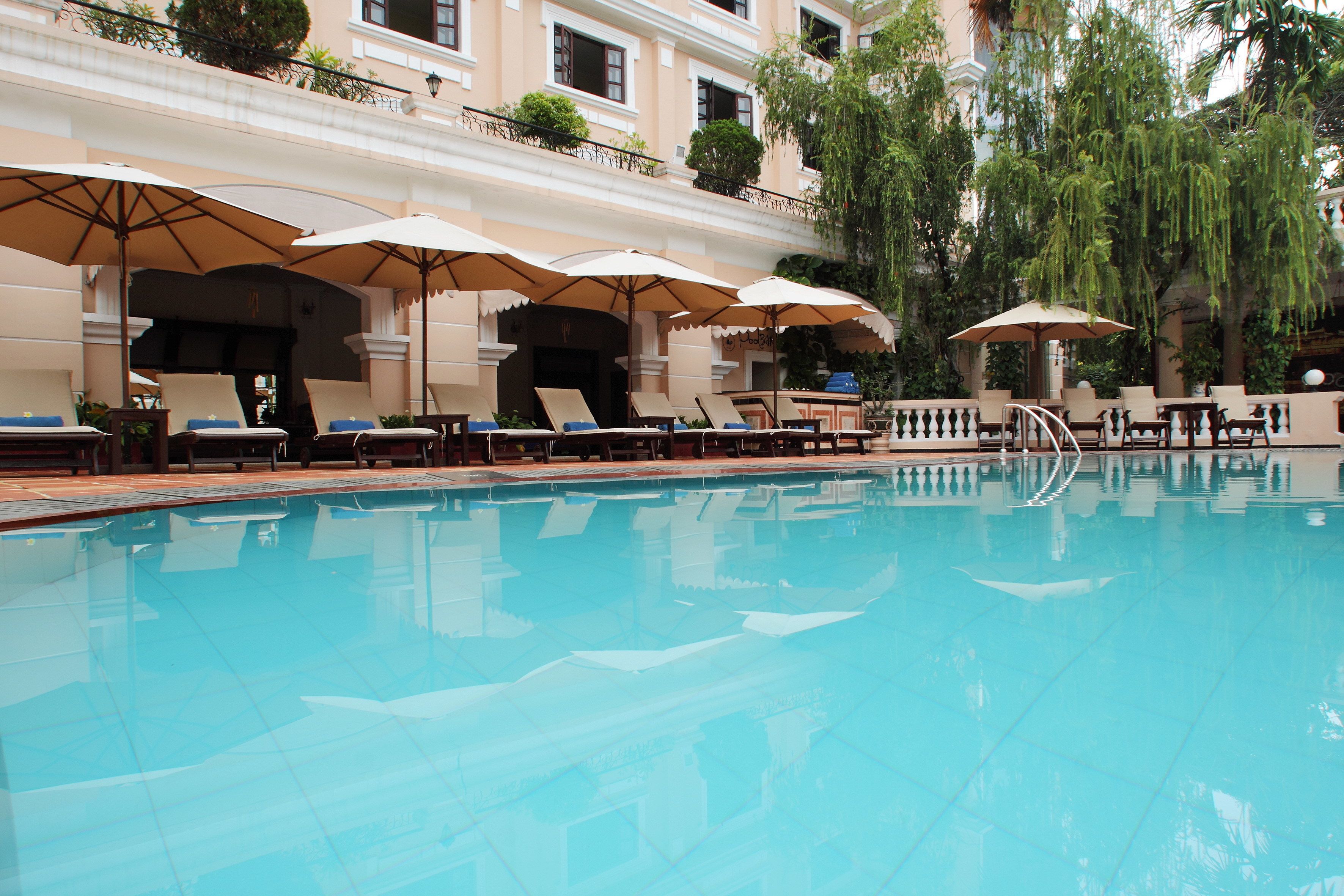 outdoor pool, pool umbrellas, pool loungers