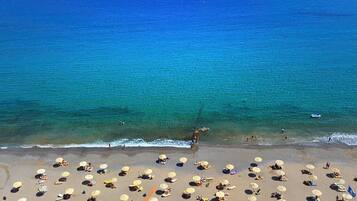 Private beach, sun loungers, beach umbrellas, beach towels