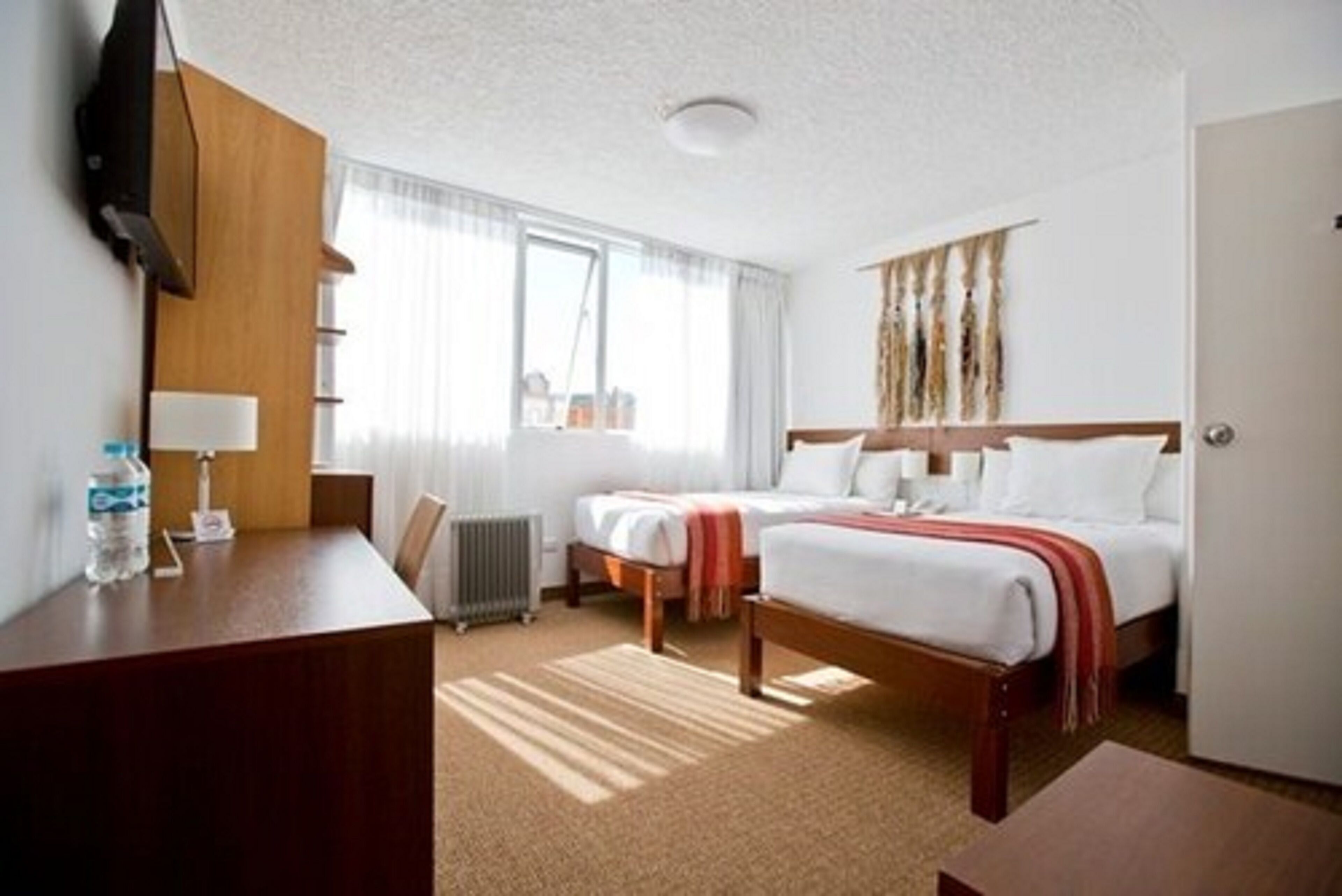 standard twin room | in-room safe, desk, free wifi, bed sheets