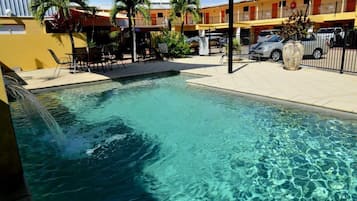 Outdoor pool, pool umbrellas, sun loungers