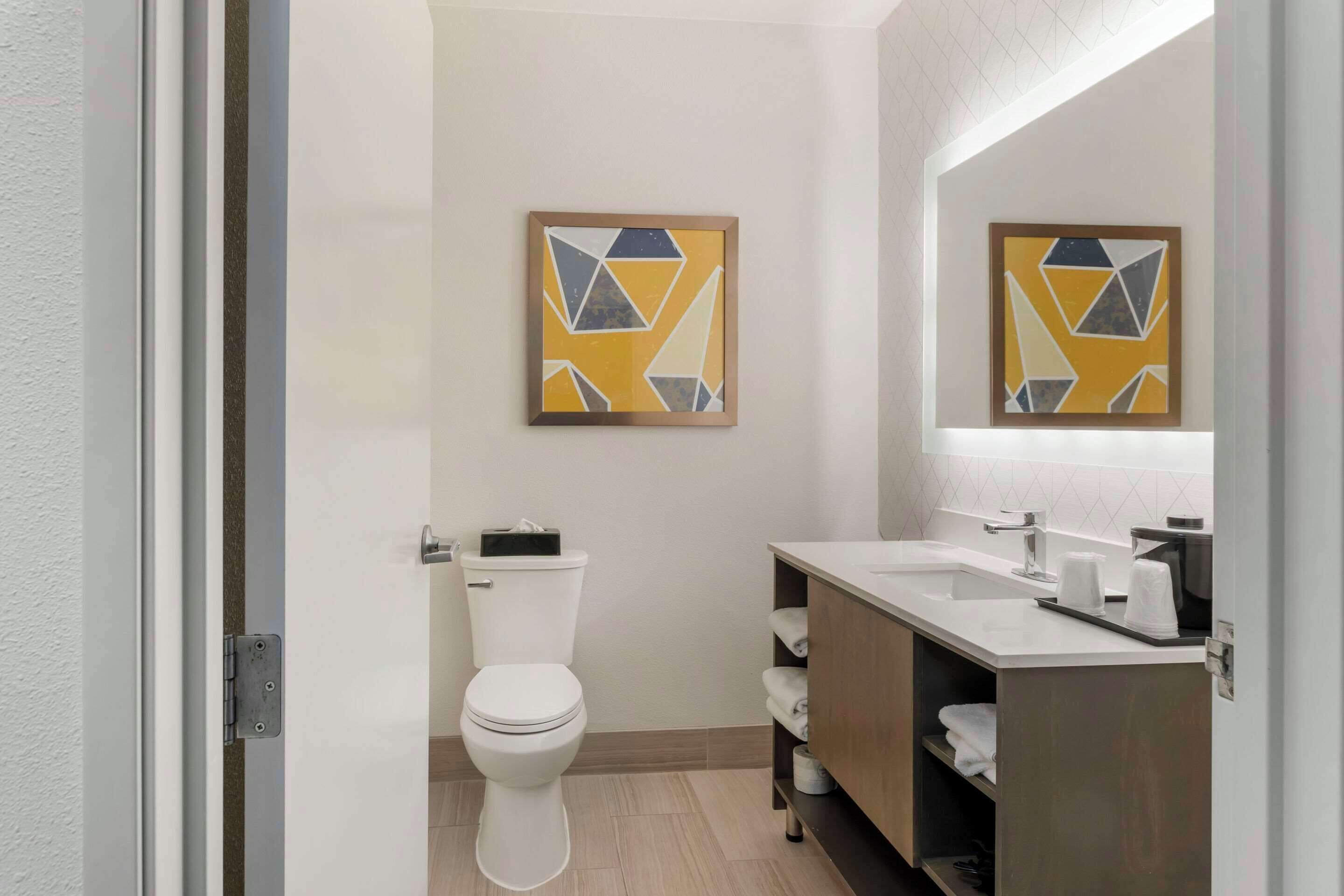 pillow-top beds, desk, blackout curtains, iron/ironing board