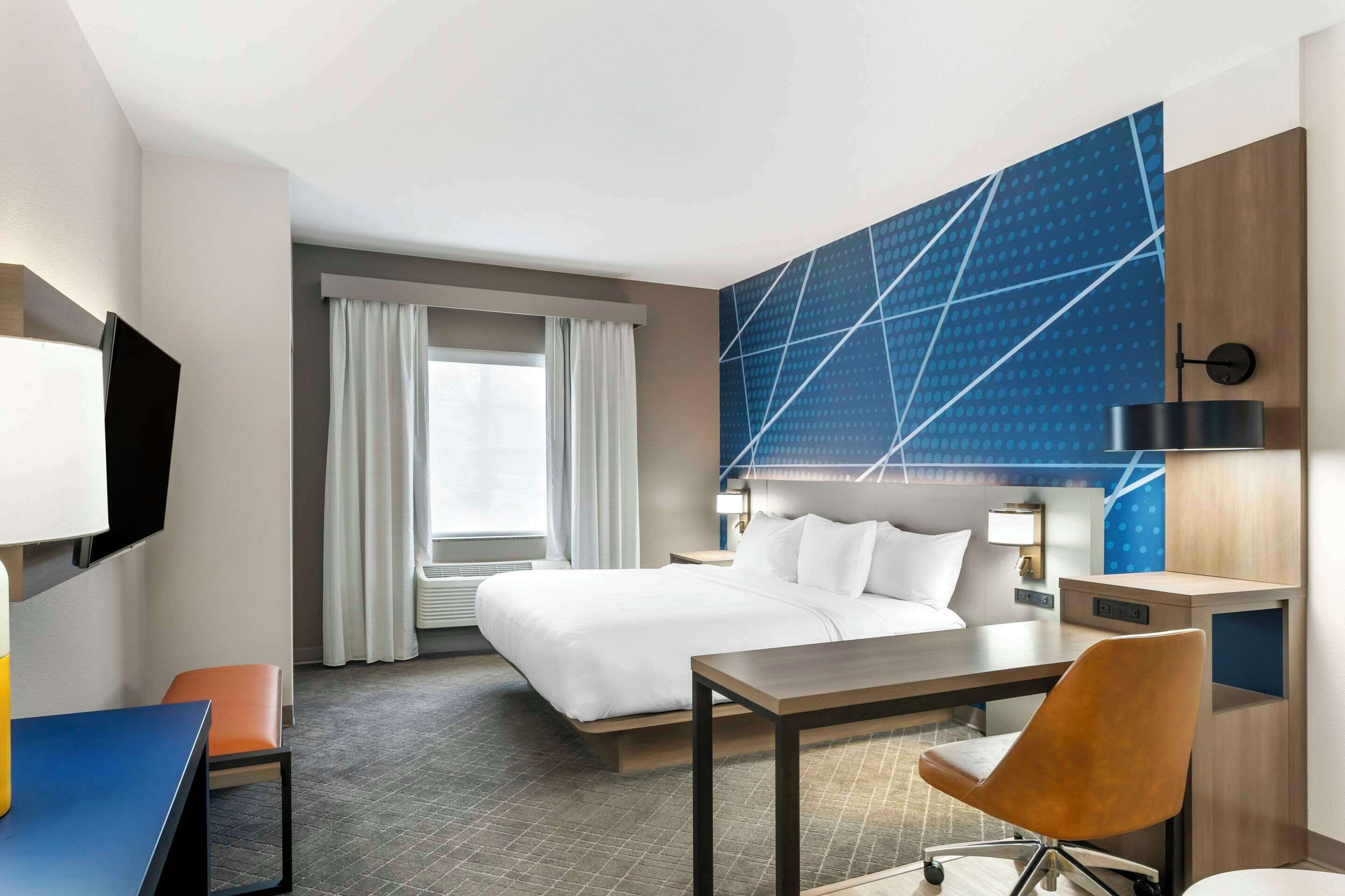 pillow-top beds, desk, blackout curtains, iron/ironing board