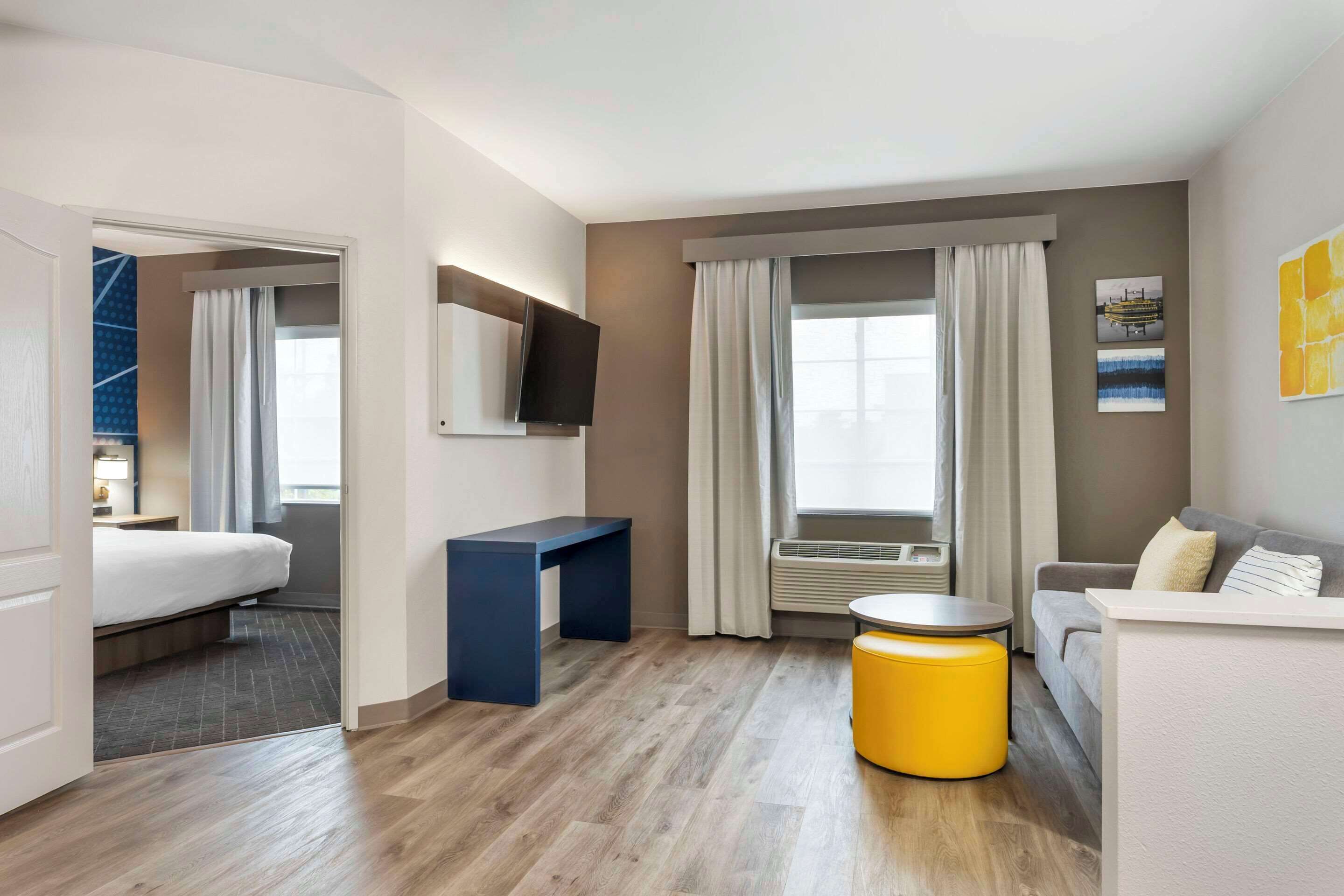 pillow-top beds, desk, blackout curtains, iron/ironing board