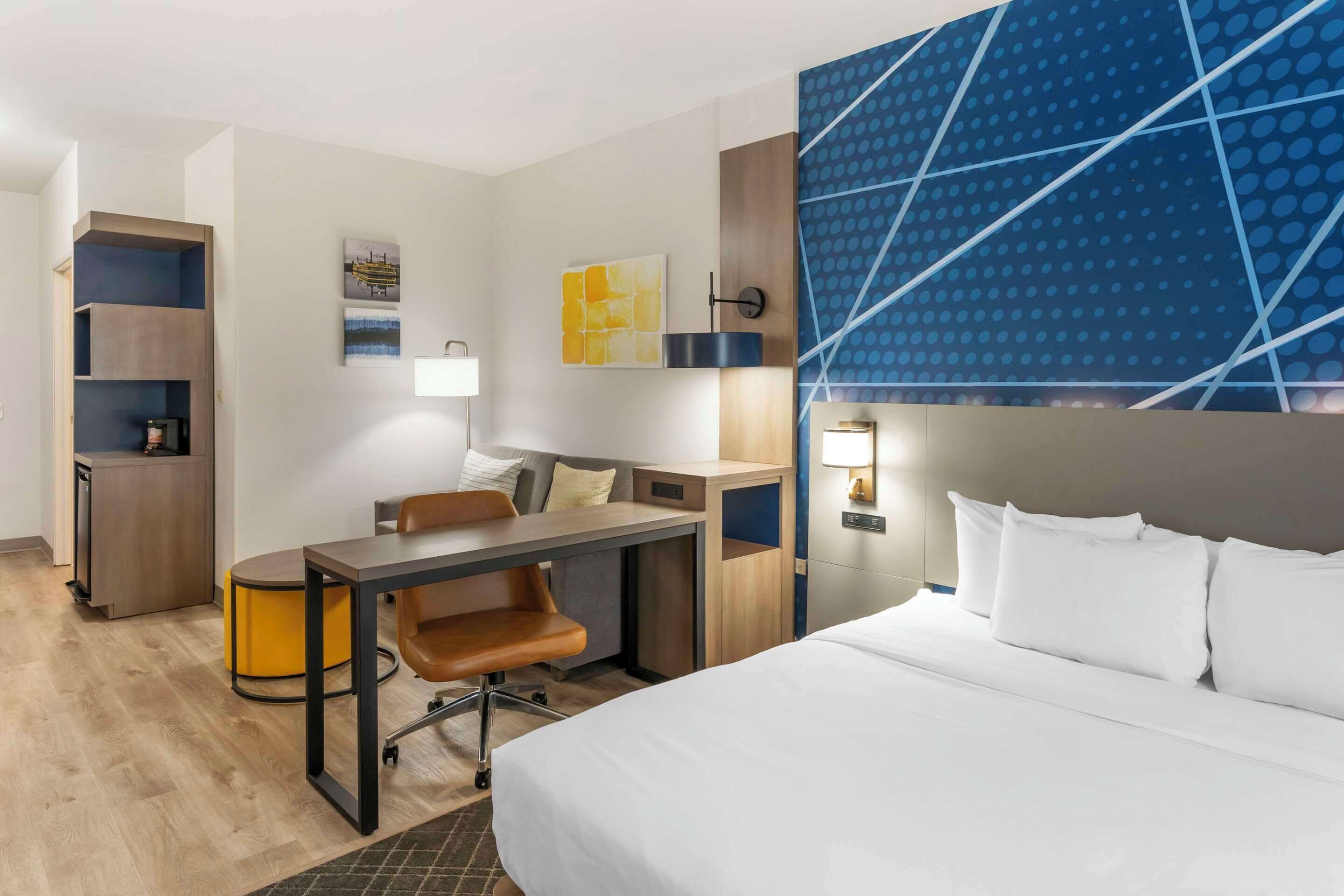 suite, 1 king bed with sofa bed, accessible, non smoking | pillow-top beds, desk, blackout curtains, iron/ironing board