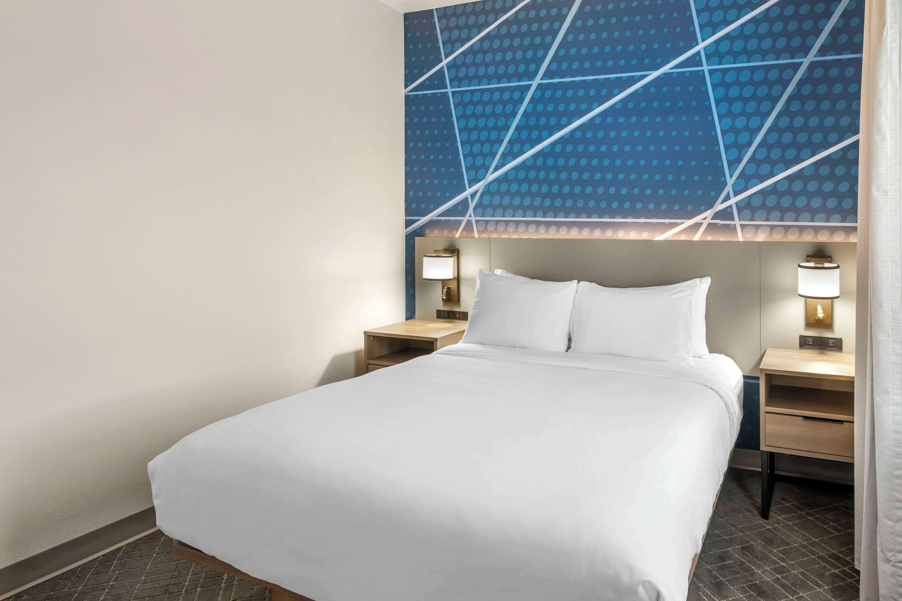 pillow-top beds, desk, blackout curtains, iron/ironing board