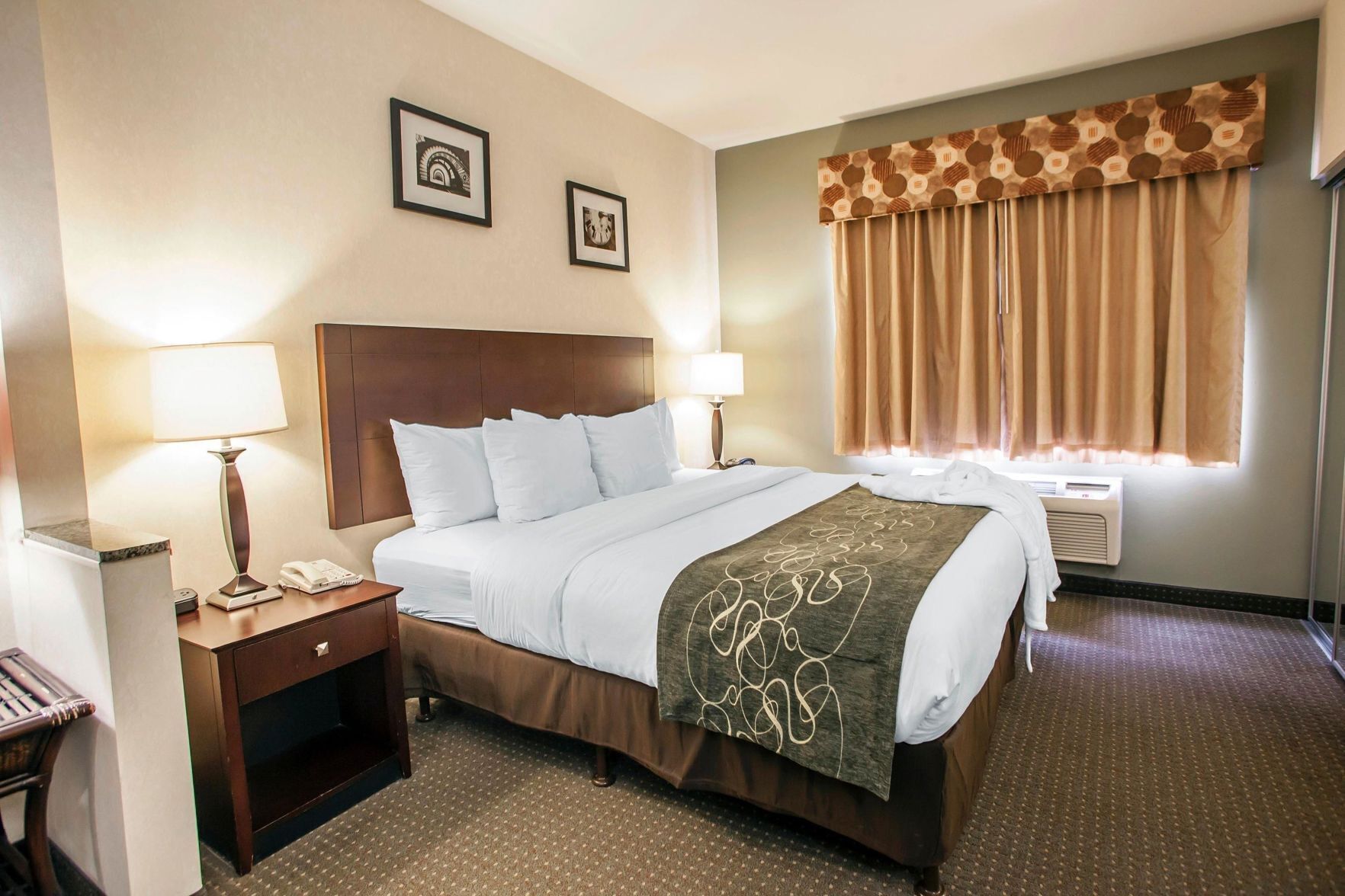 Pillowtop beds, desk, blackout drapes, iron/ironing board