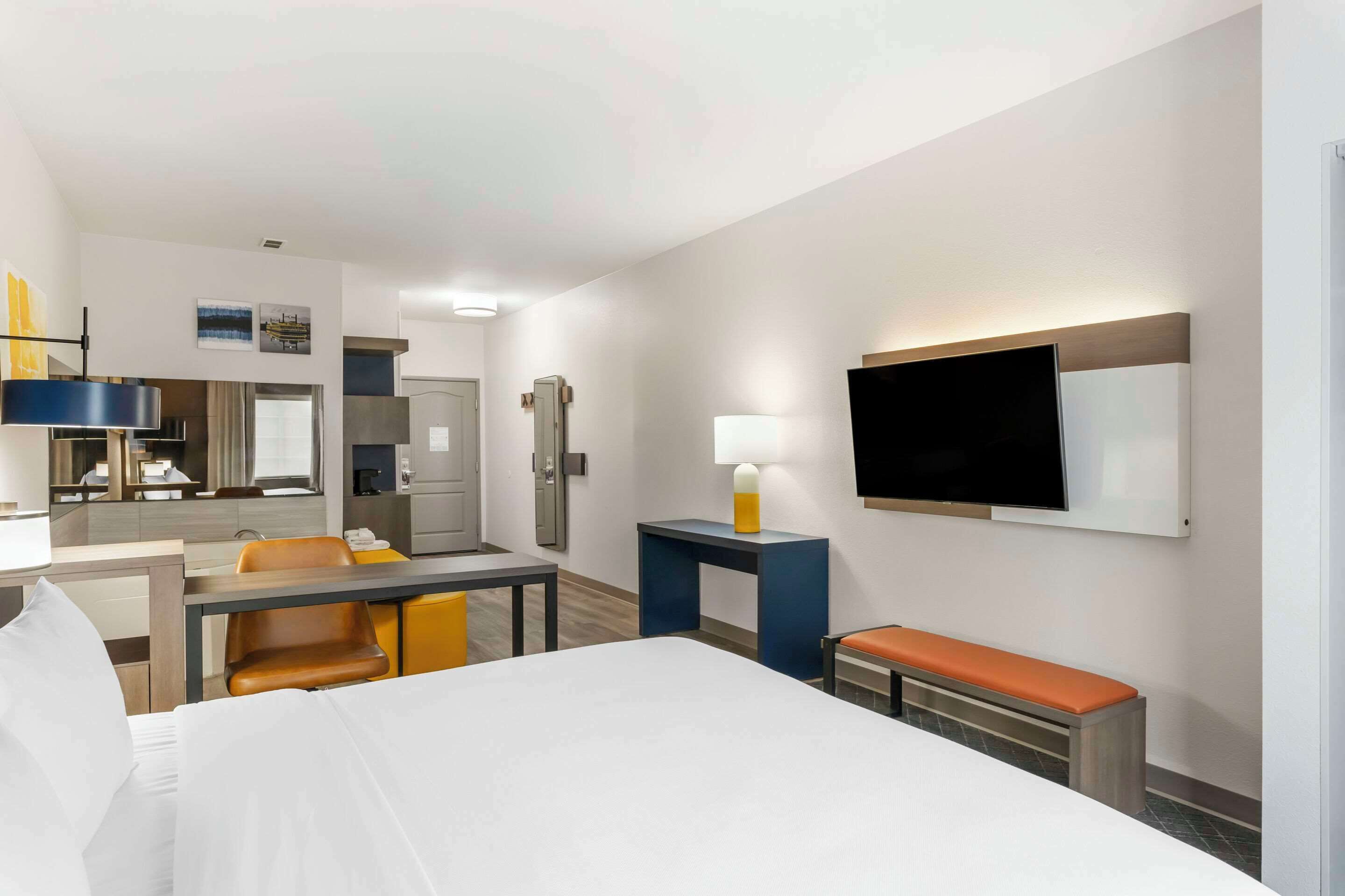 pillow-top beds, desk, blackout curtains, iron/ironing board