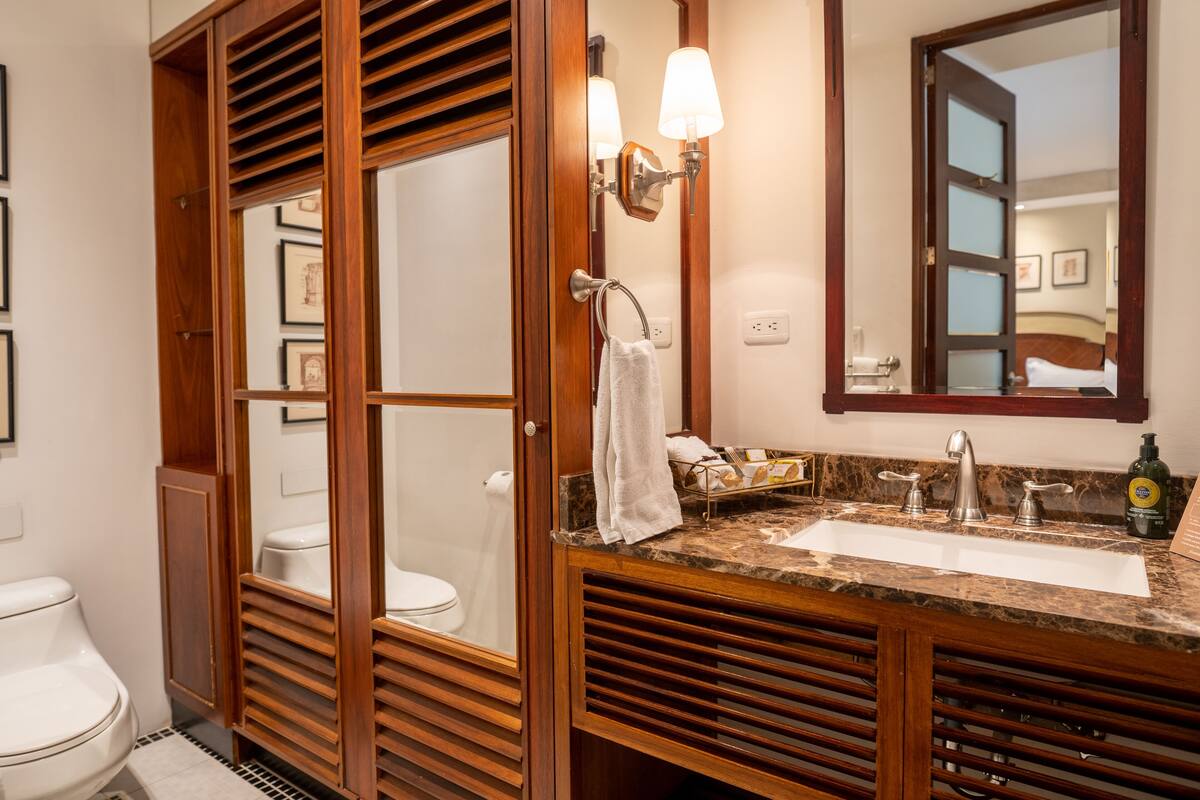 superior double room, 1 king bed | bathroom | shower, free toiletries, bathrobes, slippers