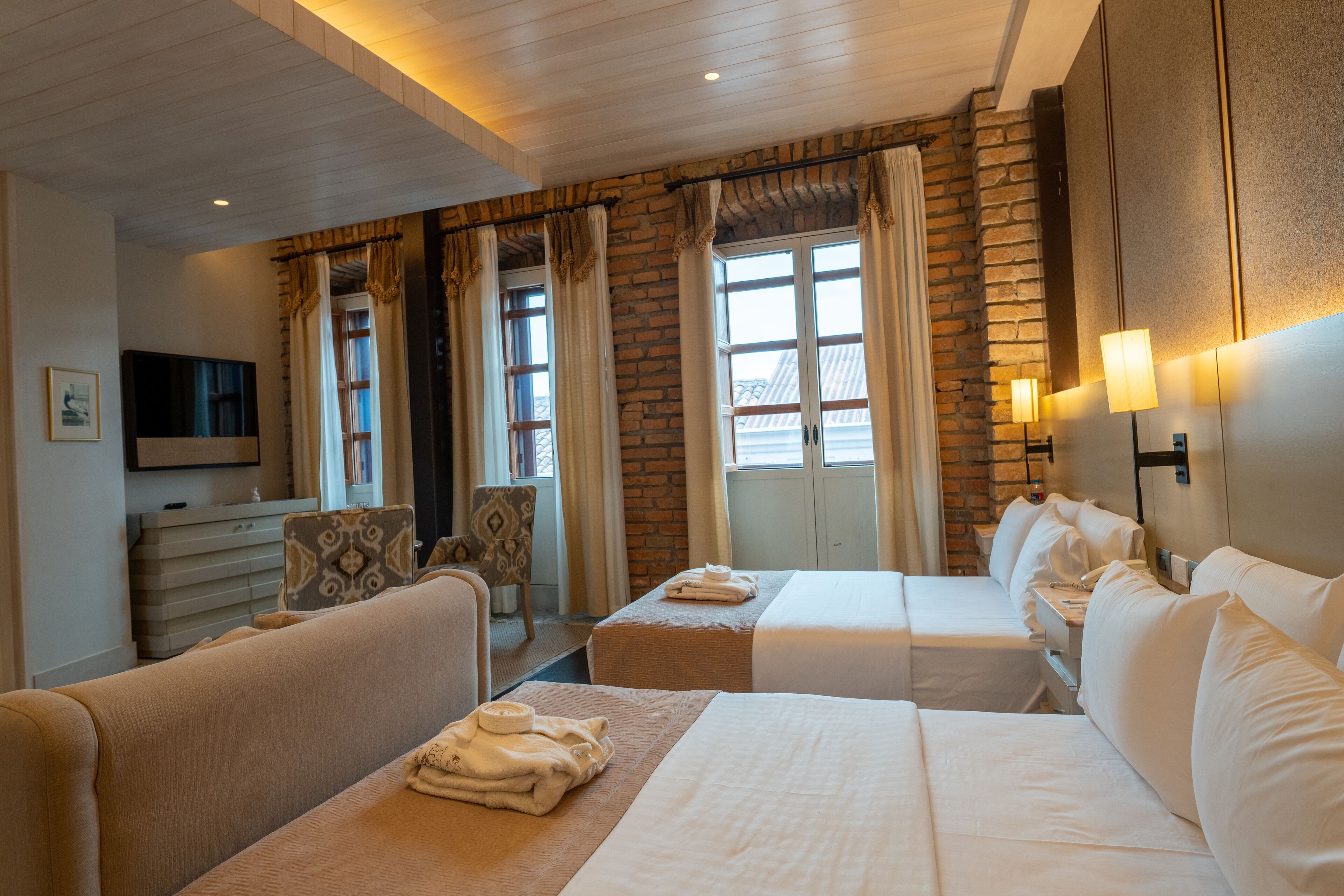 exclusive suite, multiple beds, kitchen, executive level | 1 bedroom, premium bedding, in-room safe, individually decorated