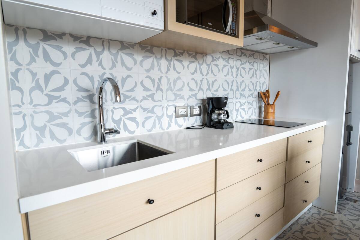 exclusive suite, multiple beds, kitchen, executive level | private kitchen | full-sized fridge