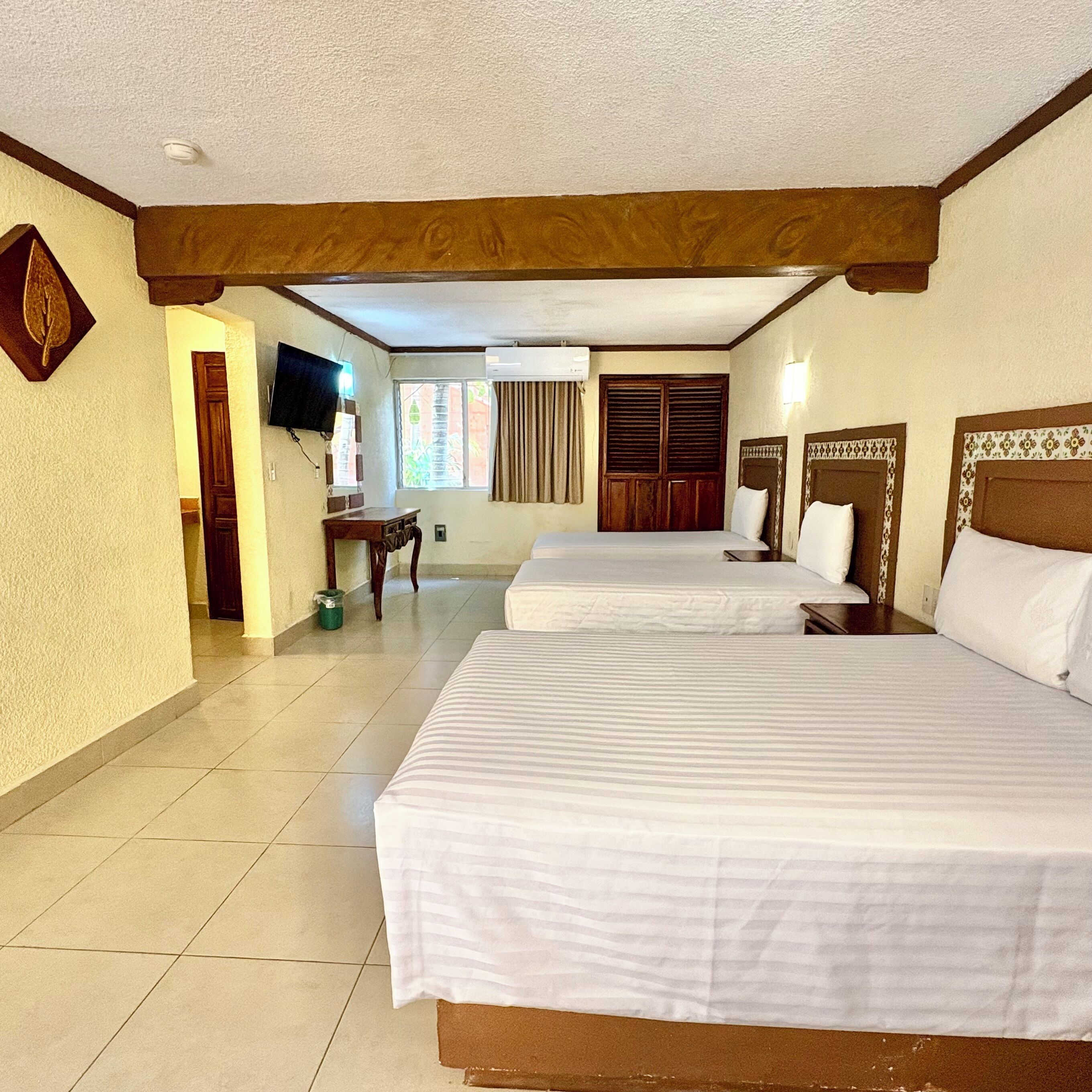 Standard Triple Room, Multiple Beds | Down comforters, individually decorated, individually furnished, desk