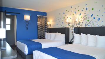 Suite, varias camas | 1 dormitorio y ropa de cama de alta calidad