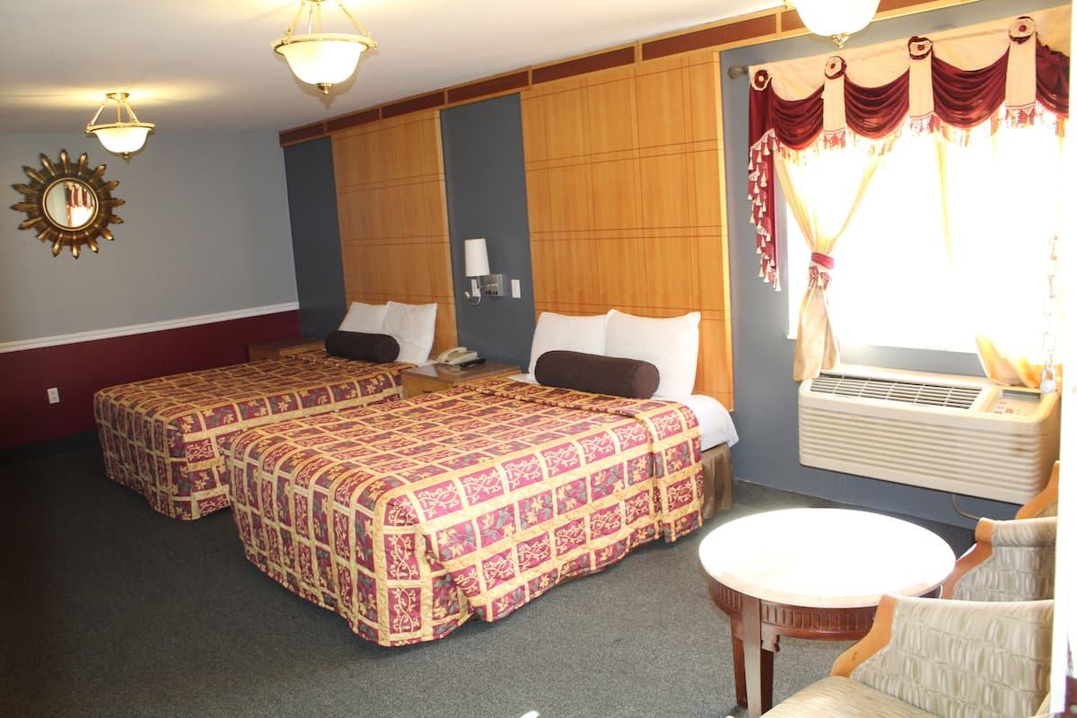 Premium bedding, desk, laptop workspace, blackout curtains