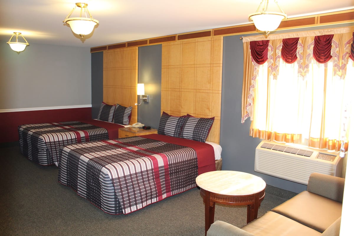 Premium bedding, desk, laptop workspace, blackout curtains