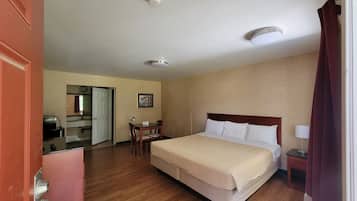 Standard Room, 1 King Bed, Smoking | Desk, free WiFi, bed sheets, alarm clocks