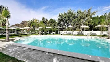 Indoor pool, outdoor pool, open 8:30 AM to 7:00 PM, pool umbrellas