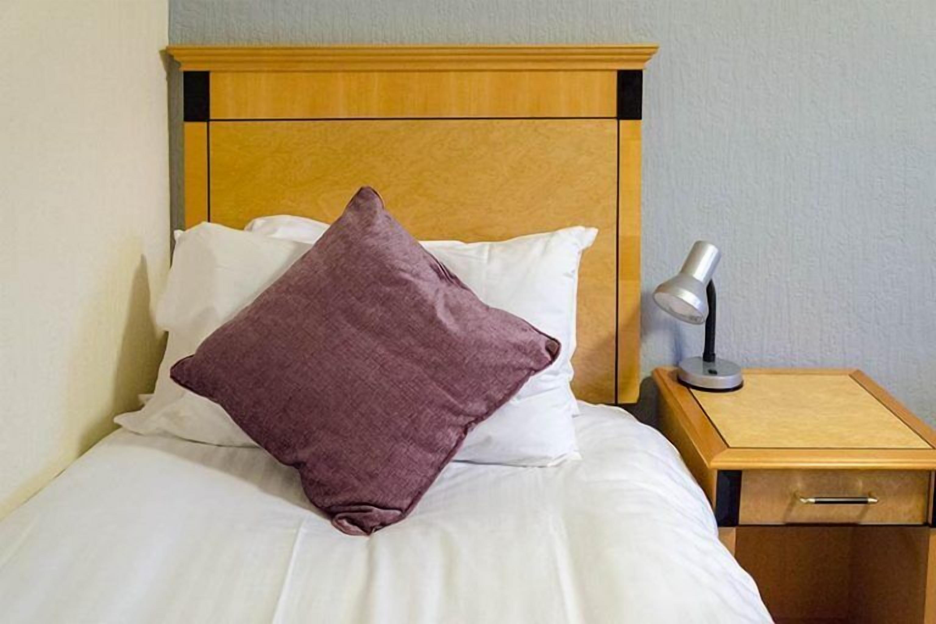 family room | desk, blackout curtains, iron/ironing board, free cots/infant beds