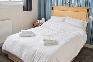 Artículos de tocador gratuitos, secador de pelo, toallas