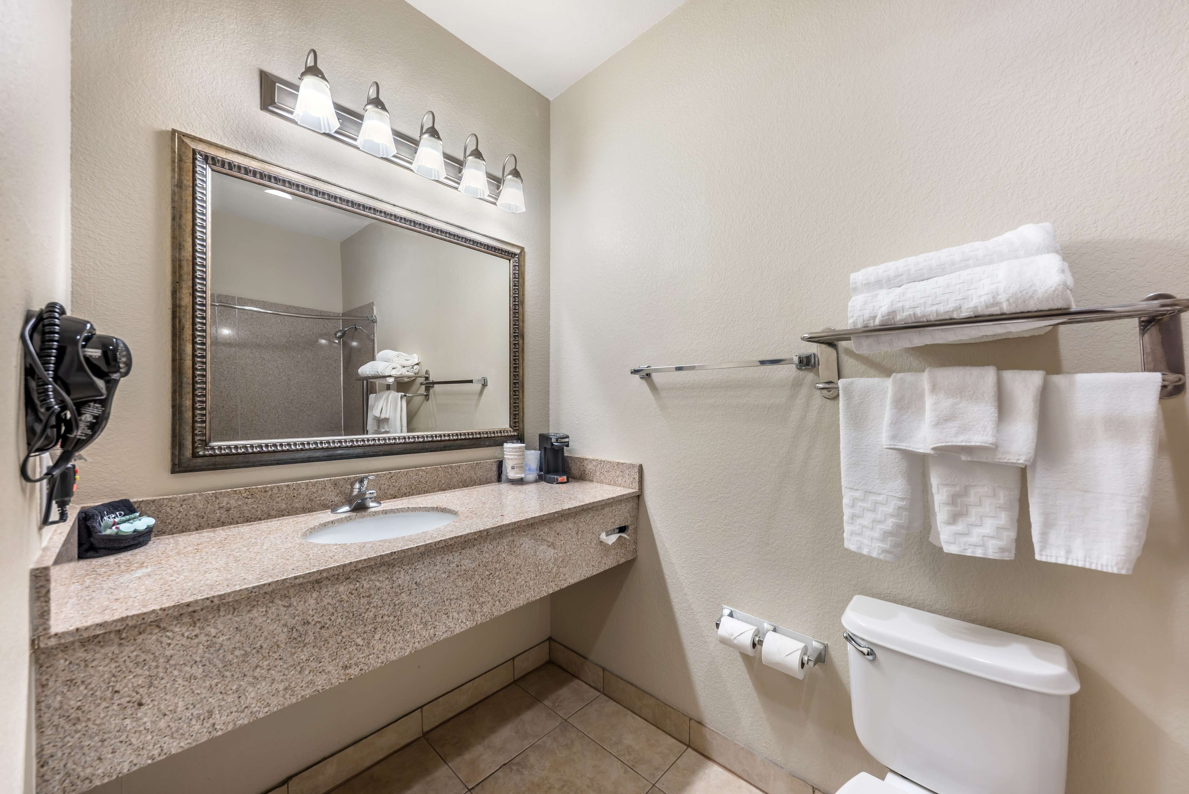 standard room, 2 queen beds, non smoking, microwave | bathroom | combined shower/bathtub, free toiletries, hair dryer, towels