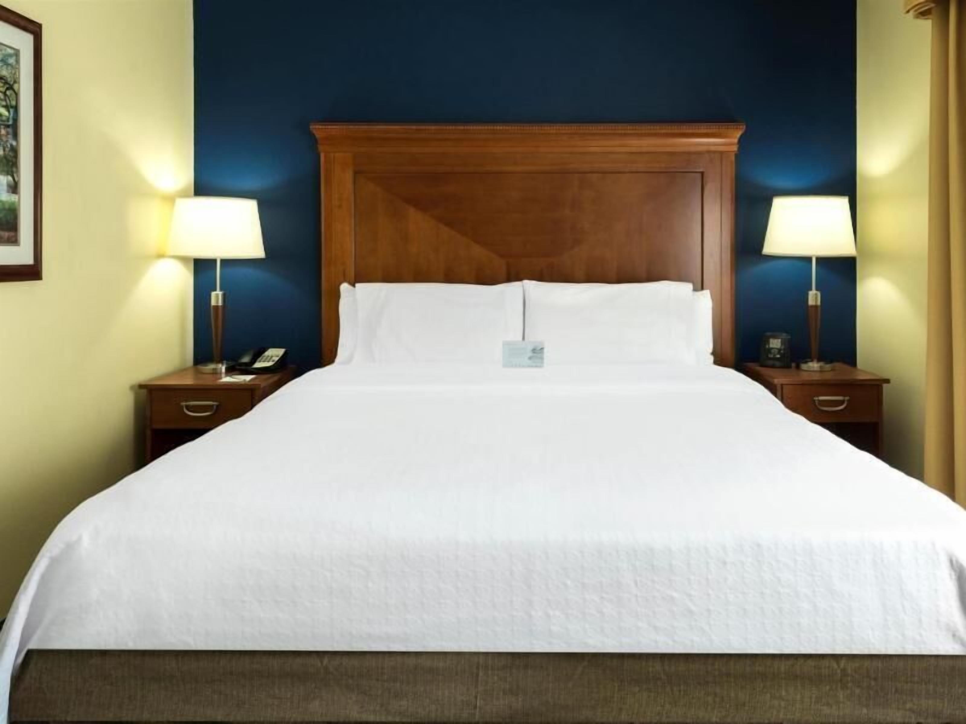 Down duvets, pillow-top beds, in-room safe, desk