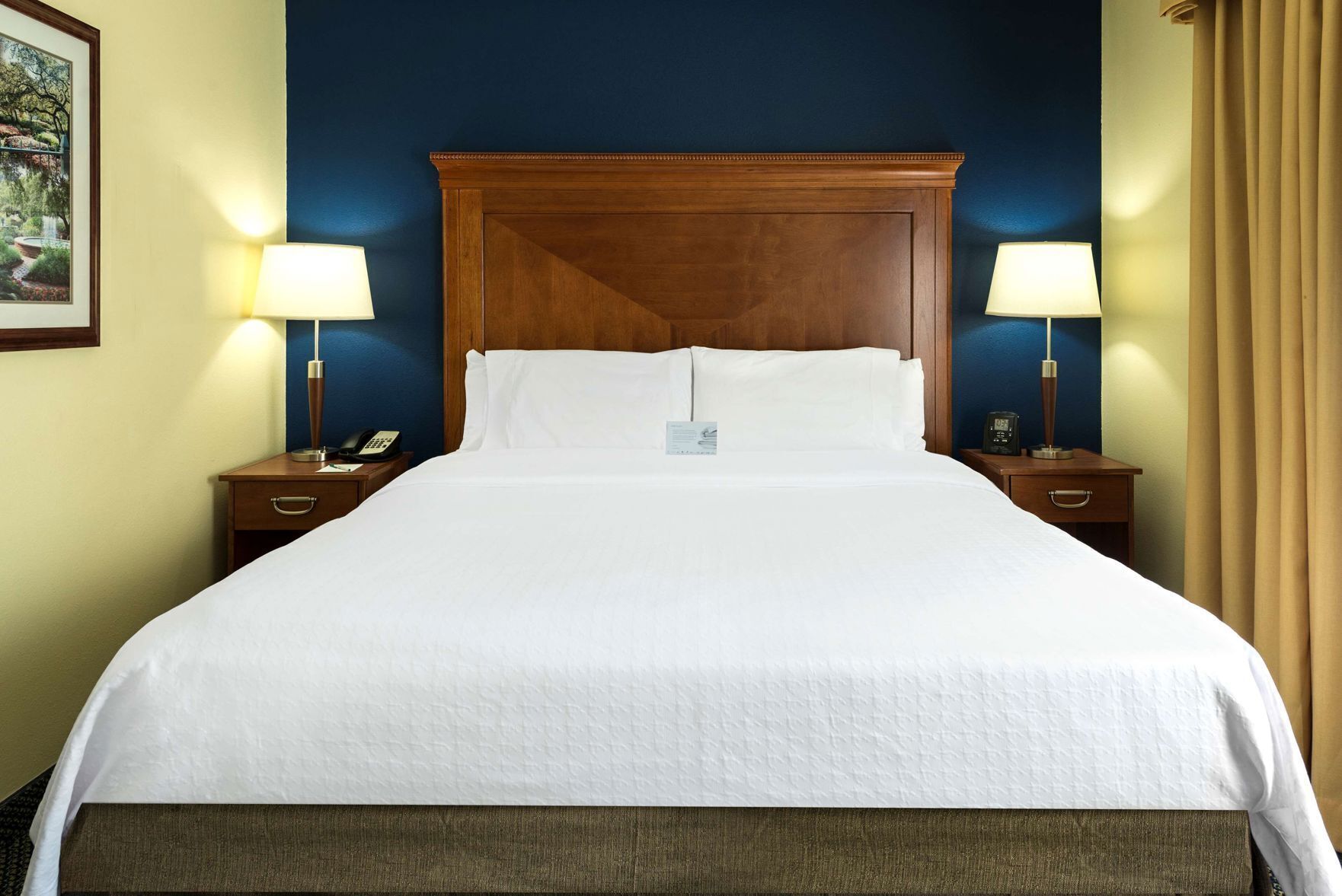 Down duvets, pillow-top beds, in-room safe, desk