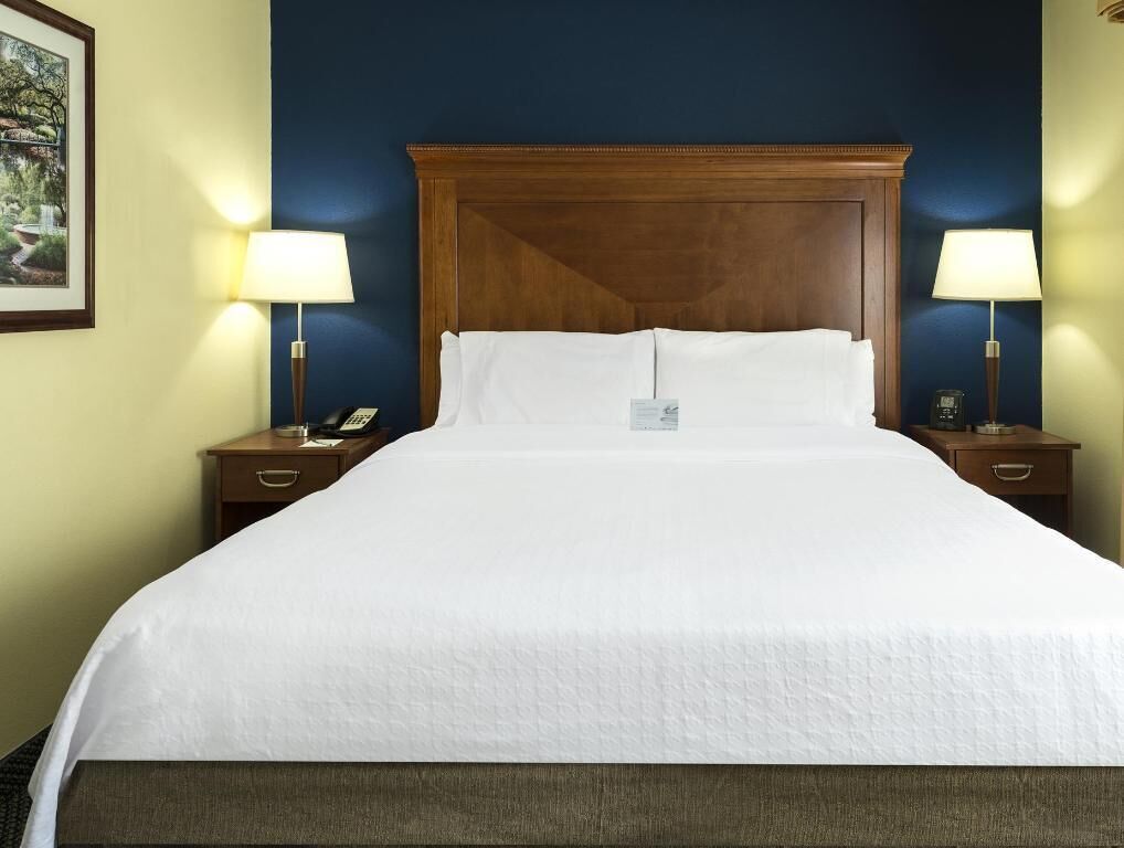 Down duvets, pillow-top beds, in-room safe, desk