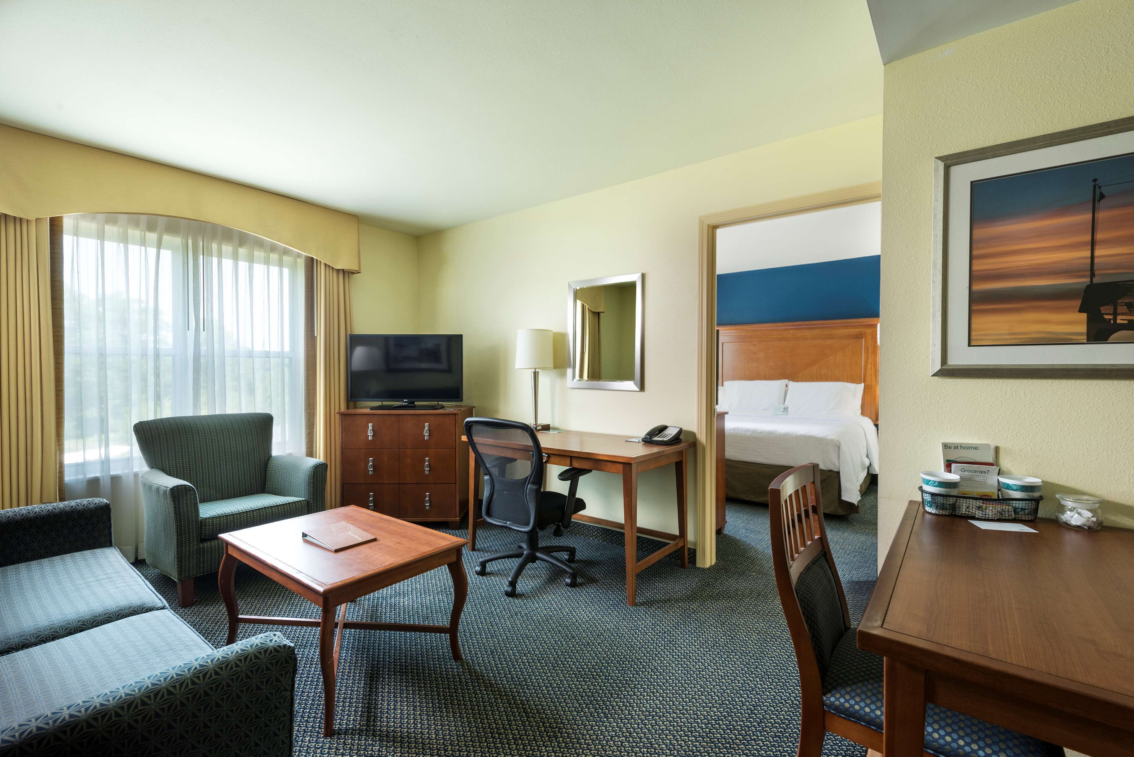 Down duvets, pillow-top beds, in-room safe, desk