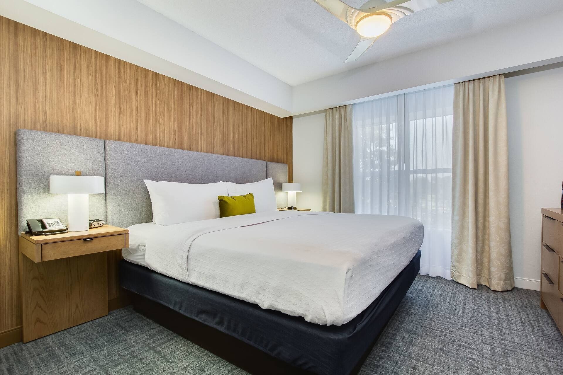 Premium bedding, pillow-top beds, desk, laptop workspace