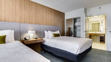 Premium bedding, pillowtop beds, desk, laptop workspace