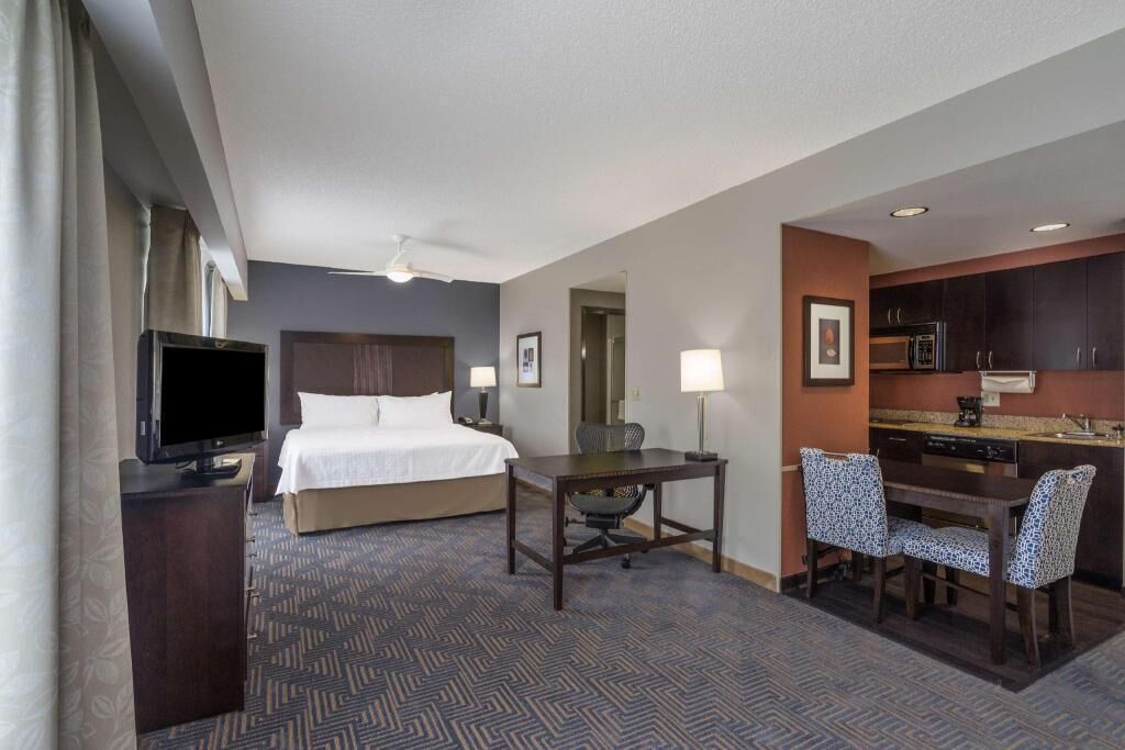Premium bedding, pillow-top beds, desk, laptop workspace