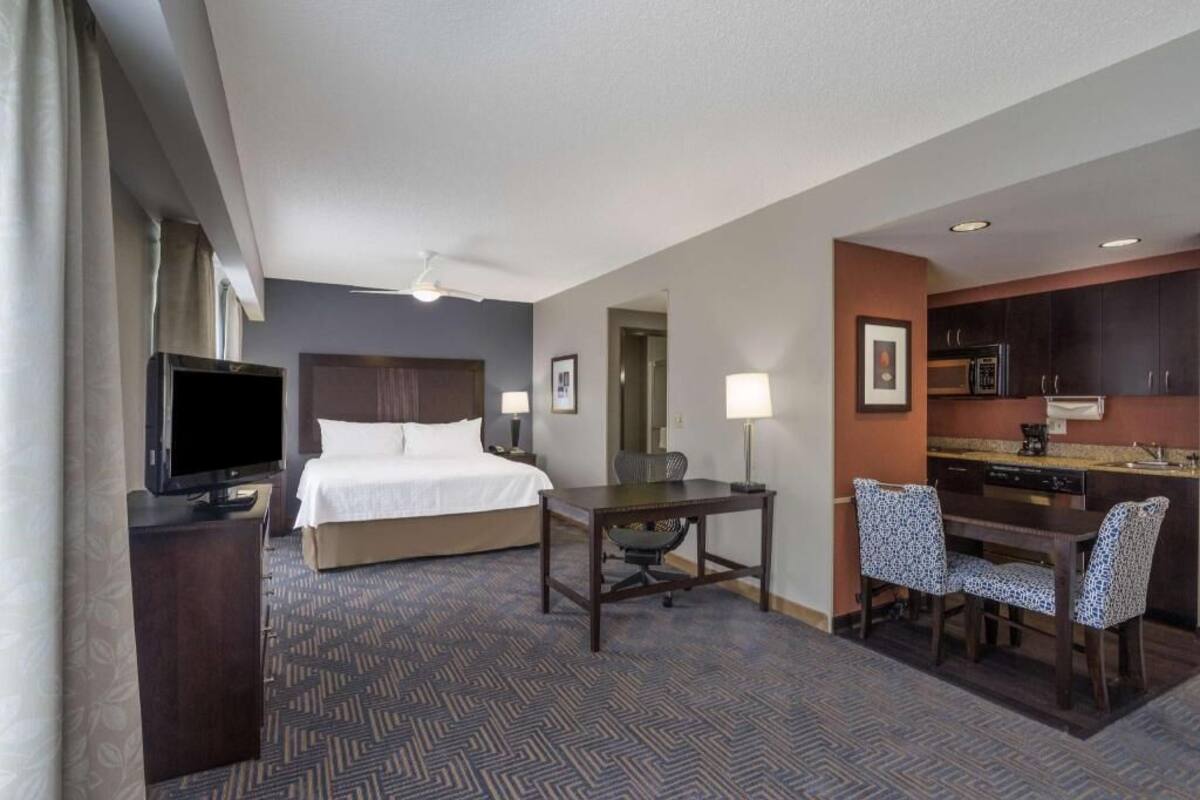 Premium bedding, pillowtop beds, desk, laptop workspace