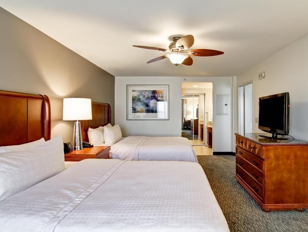 Premium bedding, down comforters, pillowtop beds, in-room safe