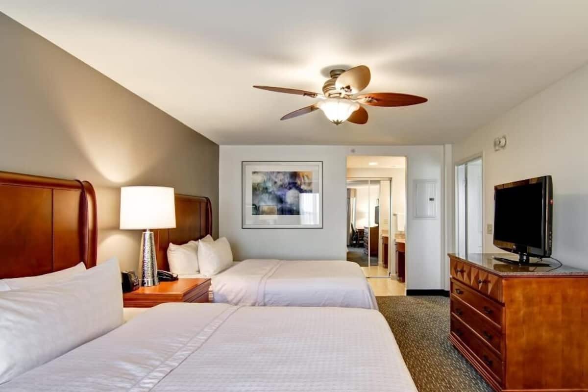 Premium bedding, down comforters, pillowtop beds, in-room safe