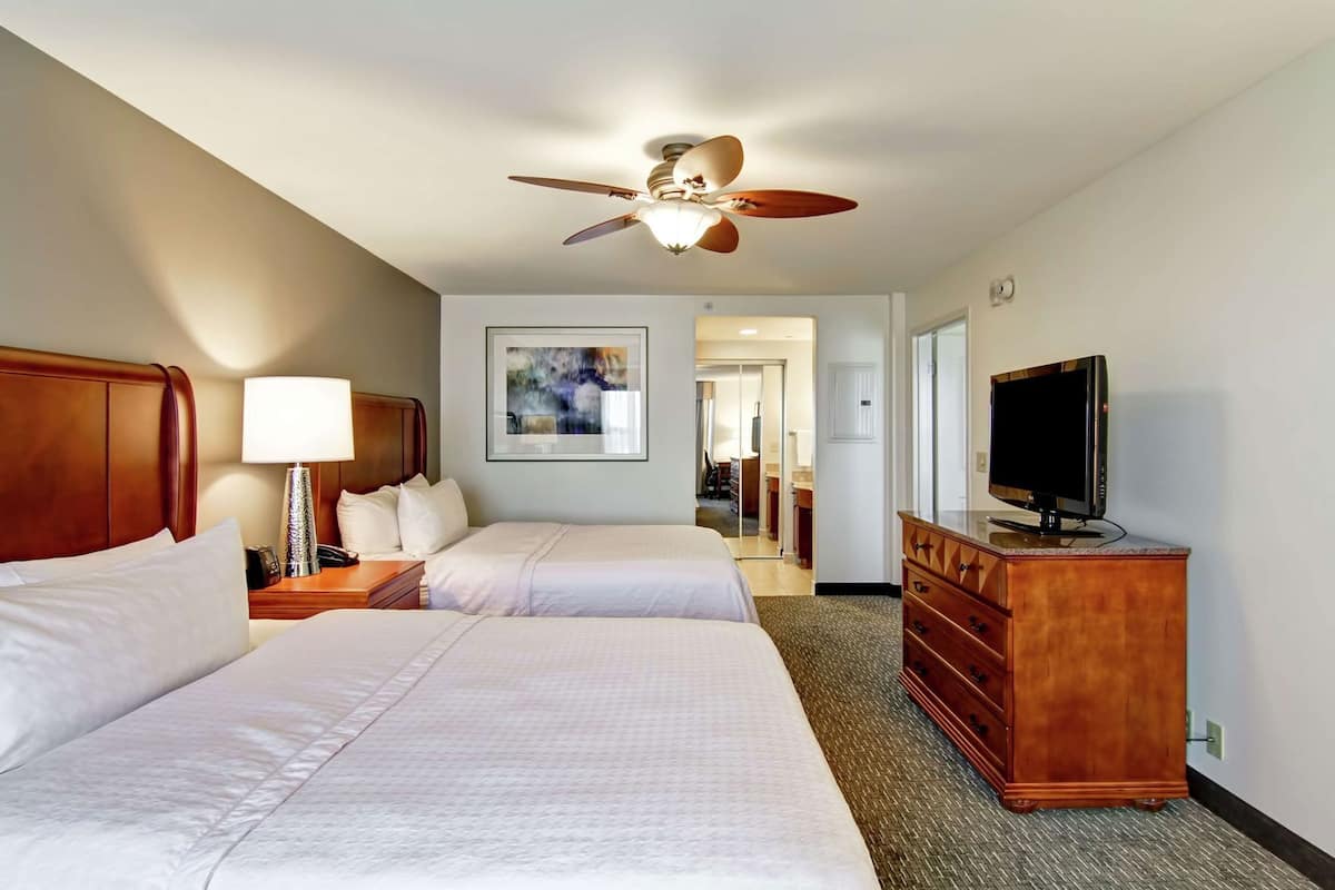 Premium bedding, down comforters, pillowtop beds, in-room safe