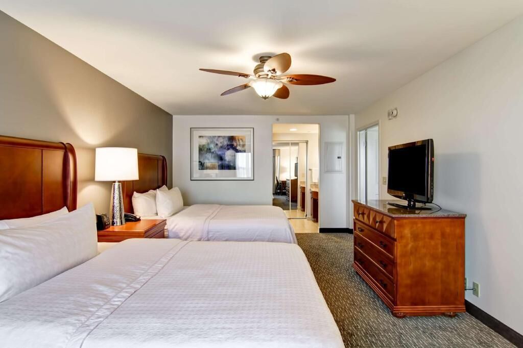 Premium bedding, down comforters, pillowtop beds, in-room safe