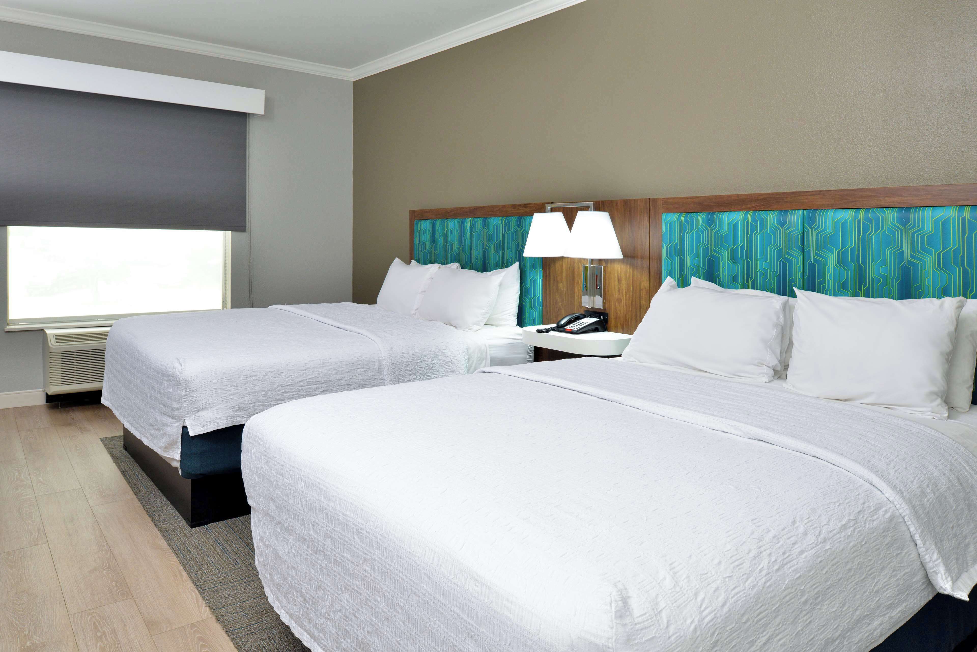 two queen beds non smoking | in-room safe, desk, iron/ironing board, free cots/infant beds