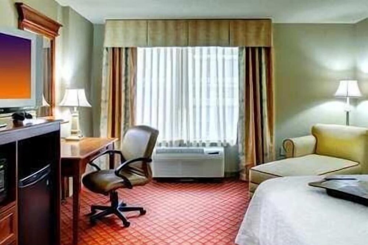 In-room safe, desk, iron/ironing board, cribs (free)