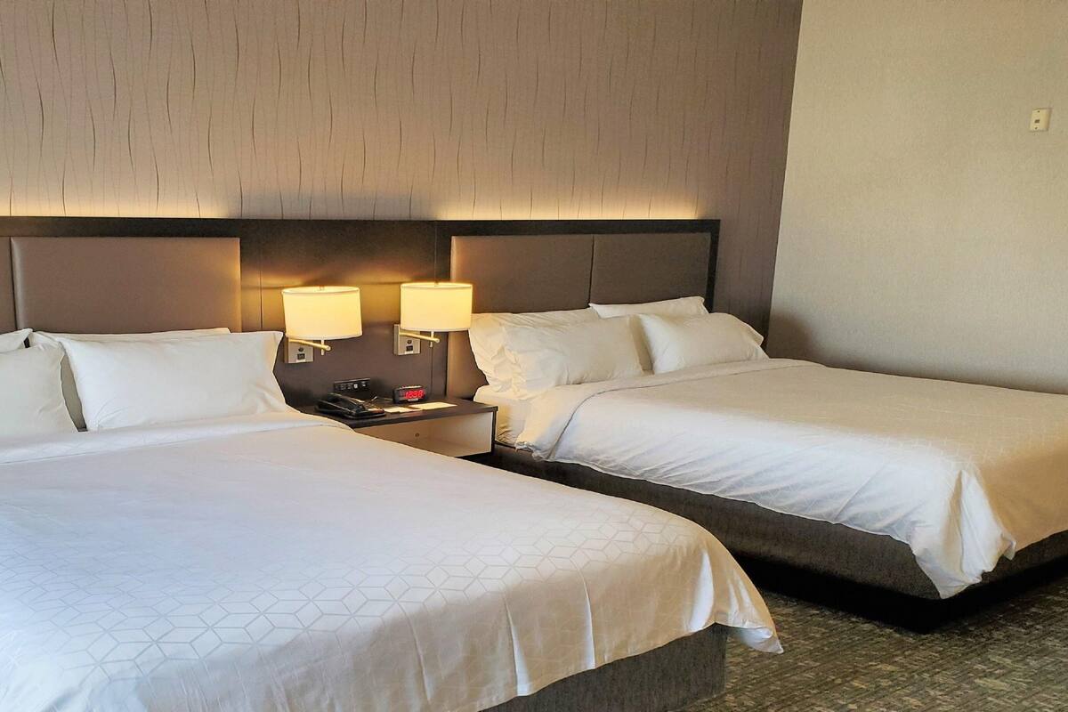 Hypo-allergenic bedding, Tempur-Pedic beds, in-room safe, desk