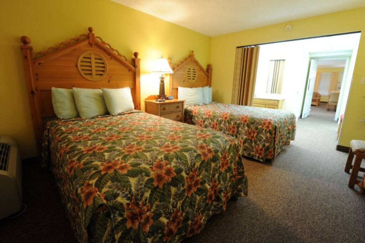 Deluxe Condo, 1 Bedroom | Iron/ironing board, WiFi (free), bed sheets